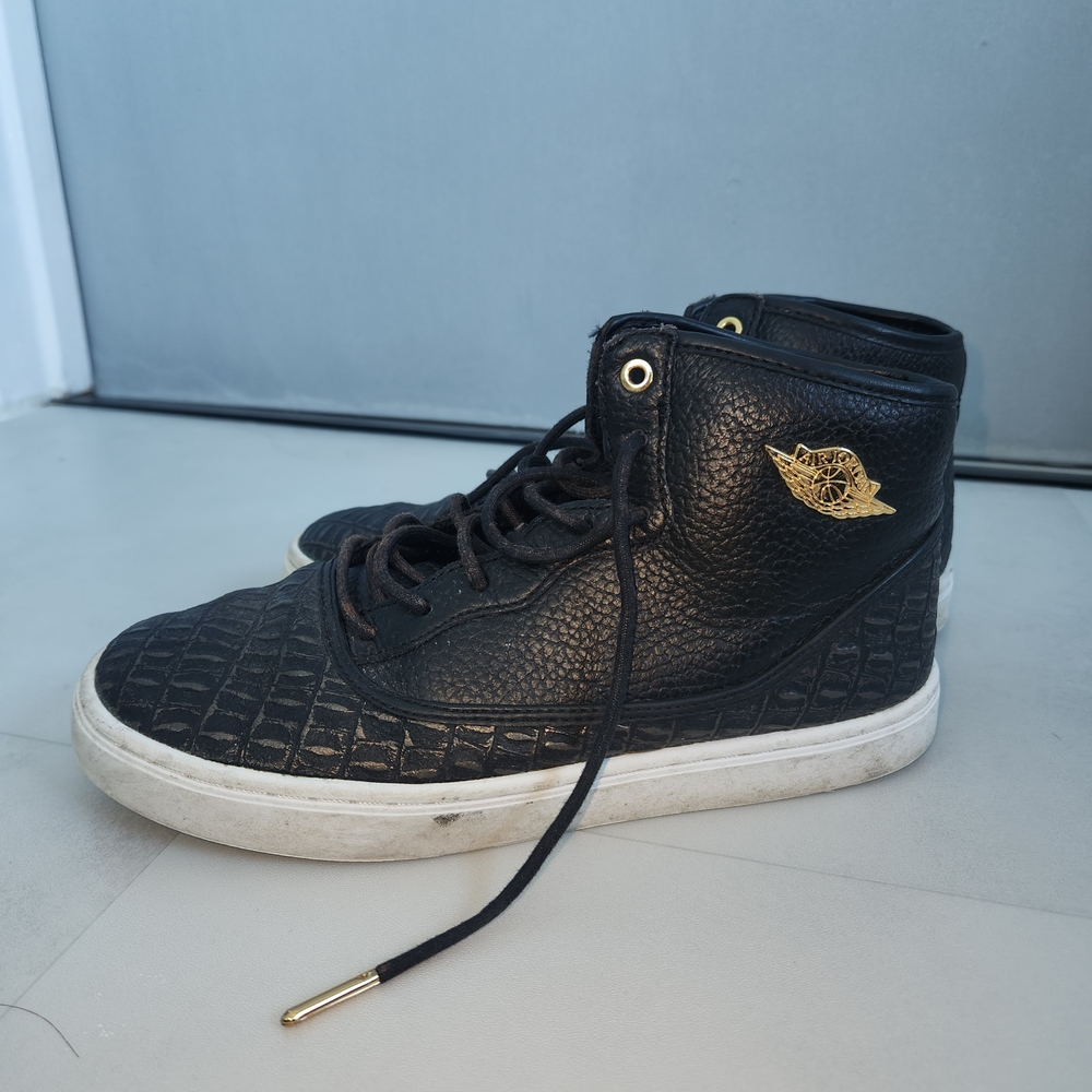Jordan Black High-Tops with Gold Accents